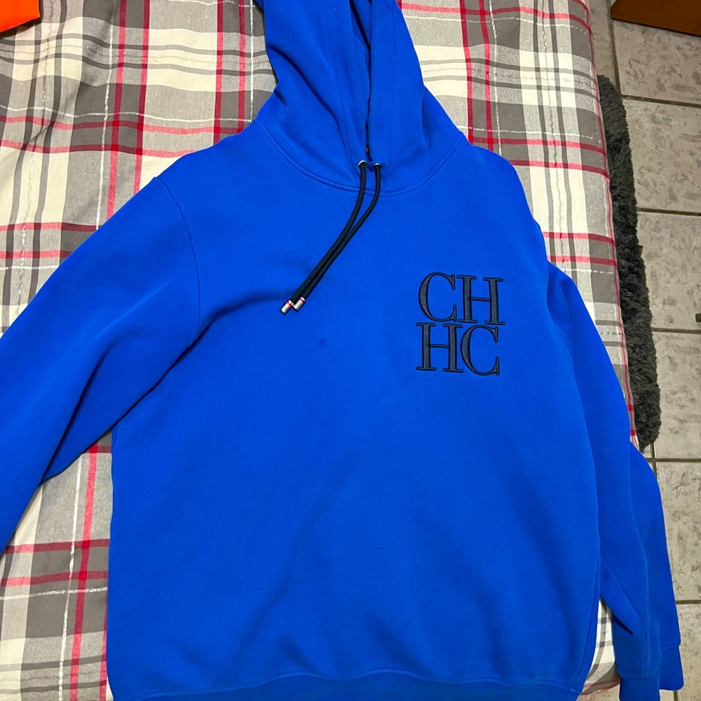I am selling a Carolina Herrera hooodie
